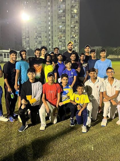 Our students with fast bowling legend Ishant Sharma after a practice session. These interactions provide inspiration and a clear goal for our young players to strive for.