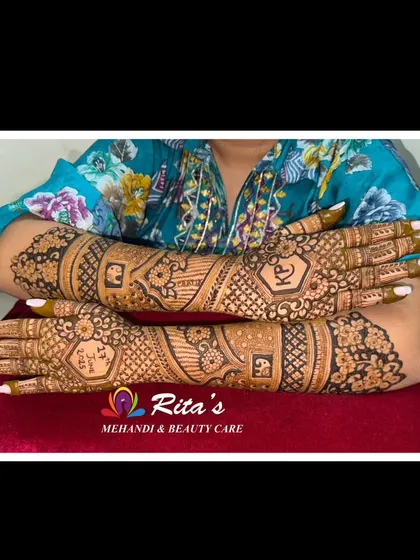 The back of the hands for a royal Gujarati bridal design.