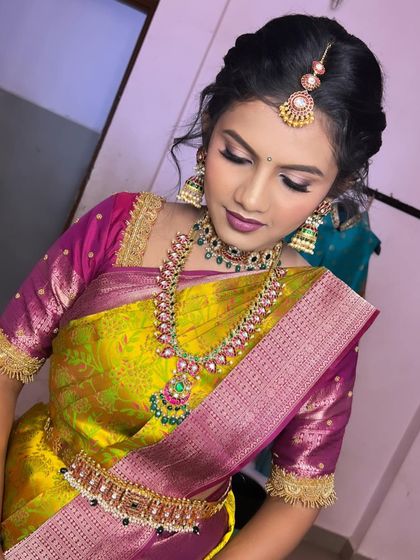 Another angle of this lovely engagement look, showing the intricate jewellery and the elegant, simple hairstyle.
