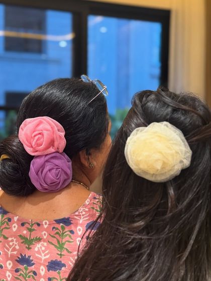 A mother-daughter moment, with both of us wearing our organza rose clips. They are truly for all ages.