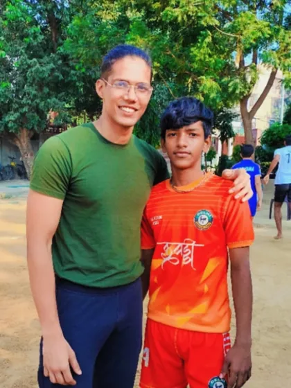 Senior player Deepanshu with one of our young, aspiring players. These moments of inspiration are priceless for the next generation of athletes.