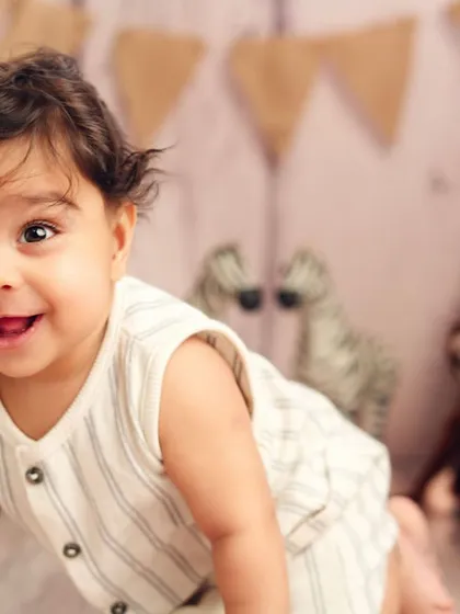 As your baby grows, capturing milestones like their first crawl is so important. These sessions are filled with energy and curiosity, showing off your little explorer's budding personality.