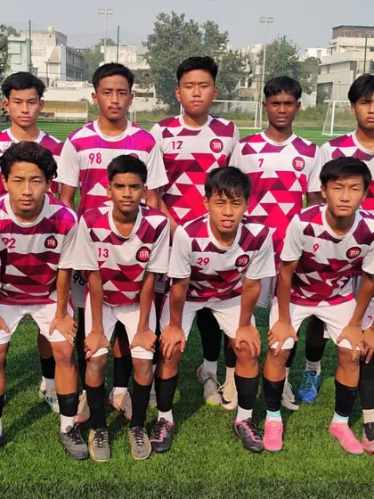 My U-15 team in their away kit, prepared for a competitive fixture in the youth league.