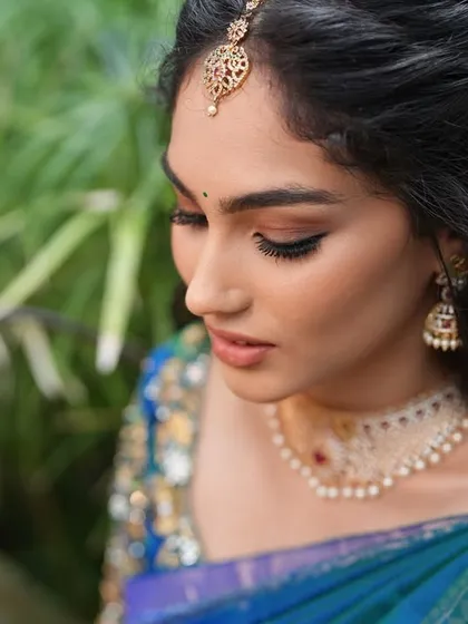 A closer look at the eye makeup for this engagement glam. I used warm, neutral tones and a soft wing to define the eyes without overpowering her features, achieving a look that is both elegant and timeless.
