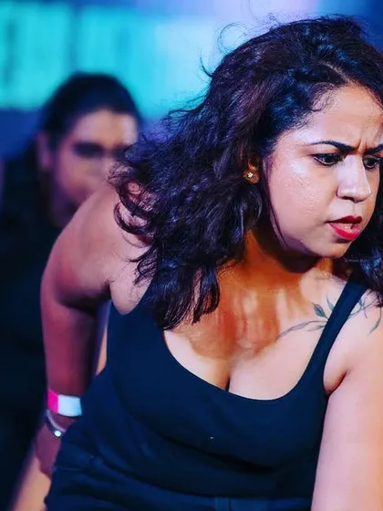 The focus and passion in the heat of a performance. This close-up from our GIDC show reflects the intensity and dedication every dancer brings to the team.