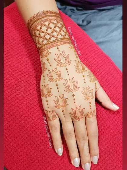 The design after the henna paste has been removed, revealing the beautiful orange stain. This shows the initial color of the natural henna I provide in my classes.