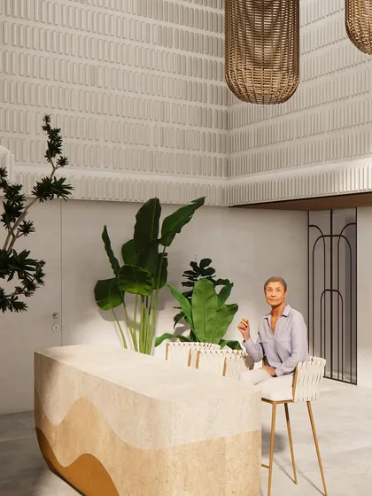 The terrace bar area is a calm counterpoint to the vibrant interiors, with a wavy, sand-colored bar and natural textures.