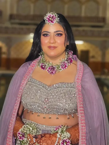 Another portrait shot, showing how the floral jewelry and makeup come together for a cohesive and beautiful Haldi look.