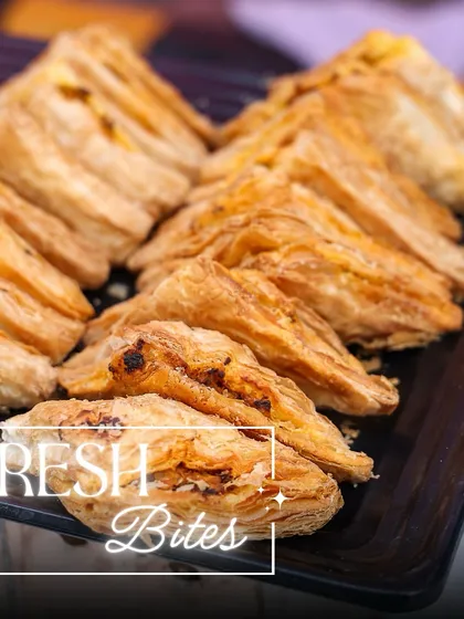 Freshly baked puffs, a perfect bite for a high-tea or breakfast menu. They are flaky, flavourful, and always a hit.