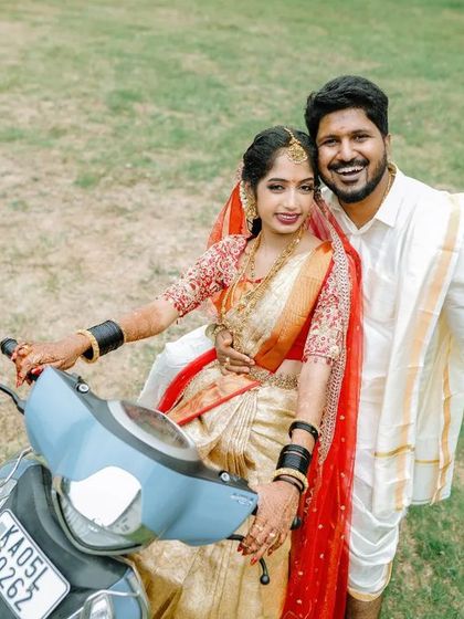 A fun and joyful portrait of the newly married couple on a scooter. We love capturing your personalities and creating fun photos to remember your day.