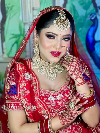 A close-up portrait of a bride. Notice the pop of shimmer on the eyelids and the perfectly blended cheek color, techniques that add dimension and glow to the face.