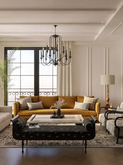 A wide view of the living area, where a mustard yellow sofa and a patterned black bench add pops of color and personality. The large windows and sheer curtains ensure the room remains bright and airy.