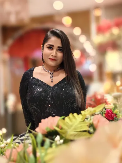 A moment of reflection amidst the beautiful decor. I believe in bringing a sense of artistry and elegance to my work, not just on stage but in every detail.