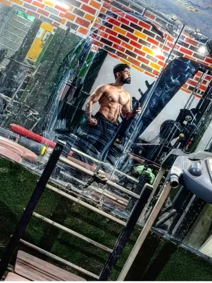 Slowly, slowly, progress is made. A reflection in the gym mirror showing my physique.