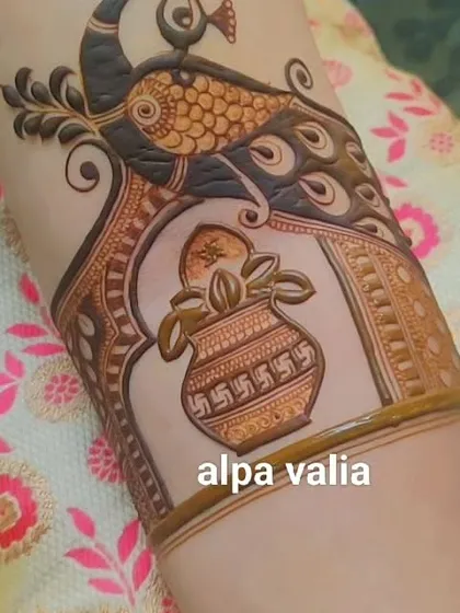 A traditional startup design with a peacock and a kalash, symbolizing prosperity and divinity.