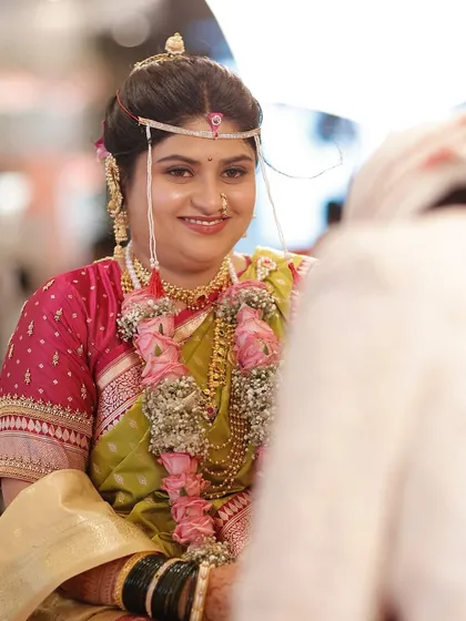 A happy, glowing bride. This is the result of meticulous skin prep and a light-handed makeup application that focuses on a dewy, healthy-looking finish.