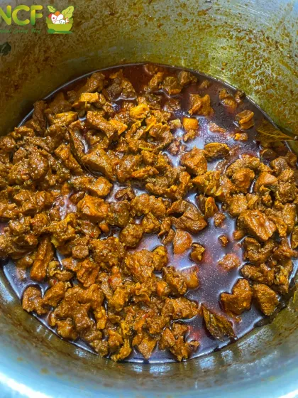 A large pot of my spicy buff curry simmering away. I cook in bulk for parties and events, ensuring there is plenty for everyone to enjoy.