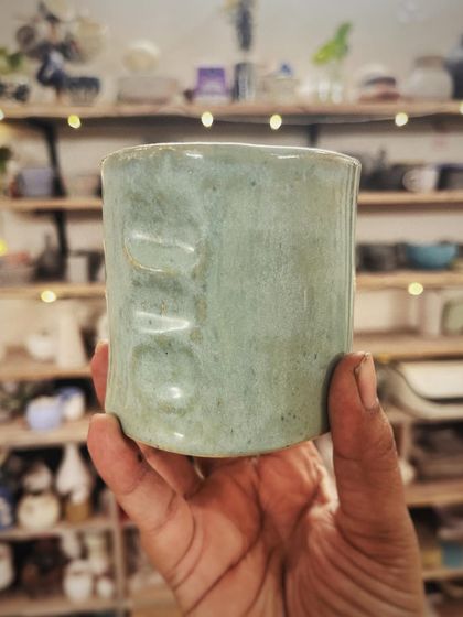 This student created a wonderful variety of forms and textures in her beginner's course, from a marbled Nerikomi bowl to a textured mug with a unique handle.