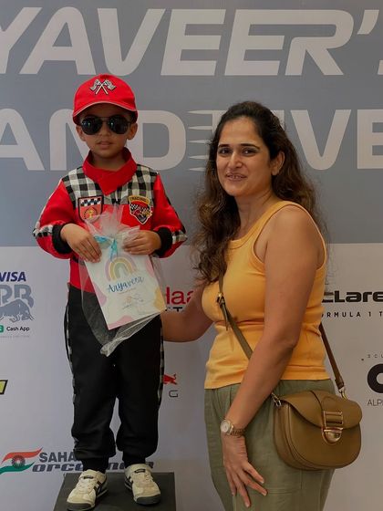 This little racer is ready for his party! I love seeing kids get into the theme and feel so proud of the art they create.