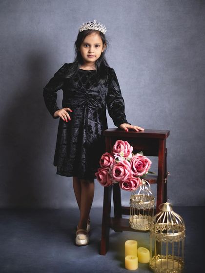 A little princess posing with a tiara. We have props suitable for kids of all ages to make their portrait session special.