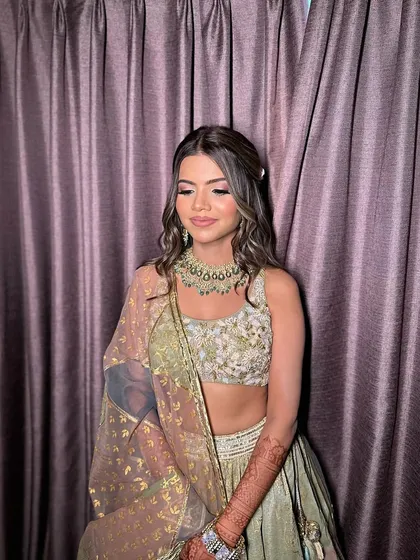 Love is in the air, and so is the glow. A fresh and pretty look for Anushka's Roka ceremony.