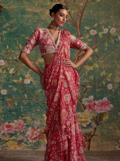 This cluster is a tribute to the saree in all its forms. It includes traditional weaves, modern pre-draped styles, and sarees paired with unique blouses, showcasing the endless possibilities for styling this iconic Indian garment.