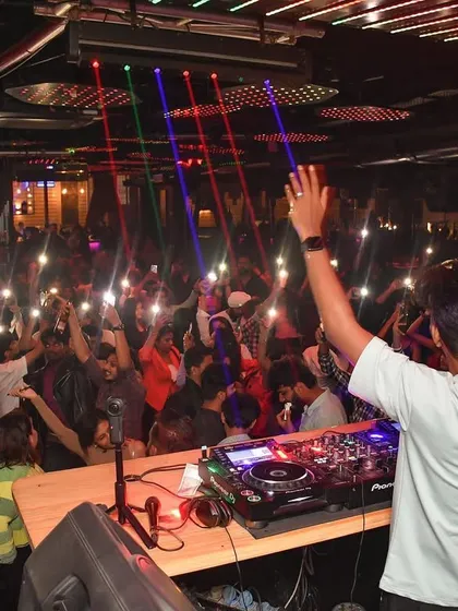My view of the crowd at Helium, with everyone's hands in the air.