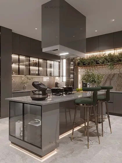 A kitchen with a grey and golden scheme can create a luxurious and modern look. This design features an island with a breakfast counter, sleek grey cabinets, and warm under-cabinet lighting.