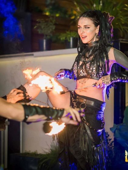 Body burning is an advanced fire art technique where flames are traced along the skin. This thrilling act demonstrates an incredible level of trust and connection with the fire.