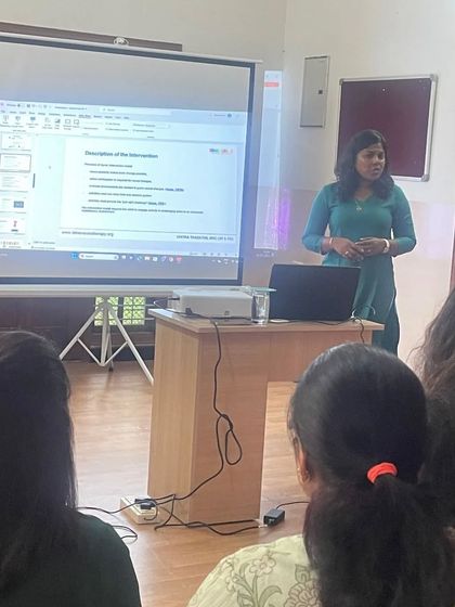 A presenter shares insights during a teacher training session. We invest in our educators to ensure they have the best tools to nurture young minds.