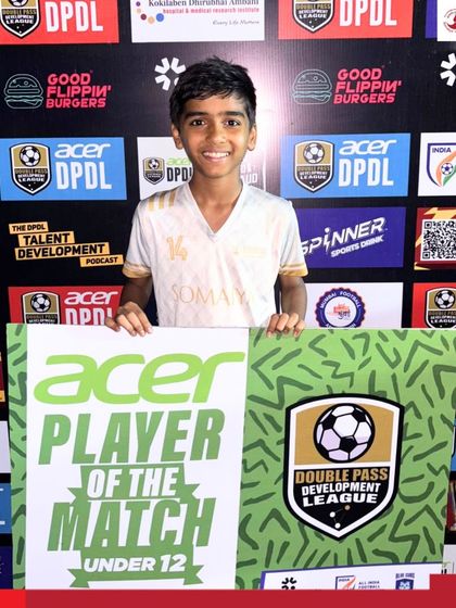 Dhyan Mavani holds his Man of the Match award after a hard-fought draw for the Somaiya FC U-12 team.
