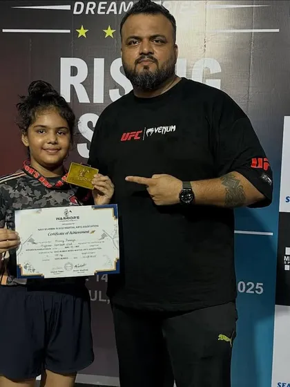 This is the pride of a champion. Here I am with Mishty Pandya after she dominated her K1 fight to win gold. We identify potential and nurture it into victory. Her success is a testament to our process.