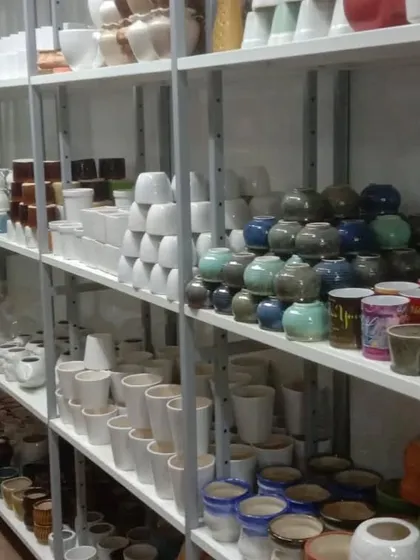 A glimpse of our diverse ceramic pot inventory, including glazed, matte, and textured finishes in a multitude of colors.