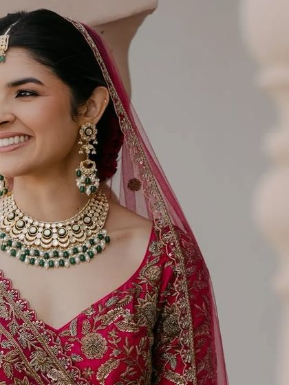 A candid smile from my radiant Jaipur bride. Her hot pink lehenga was the perfect match for the winter sun, and we kept her makeup fresh and youthful to let her natural beauty shine.