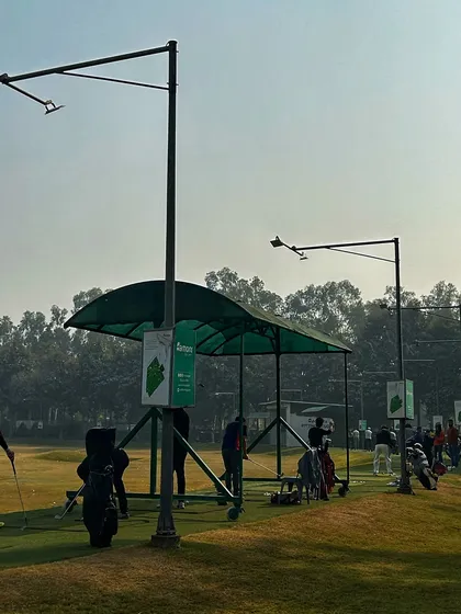 A view of the range on a clear day, with our portable canopies providing shade for players.