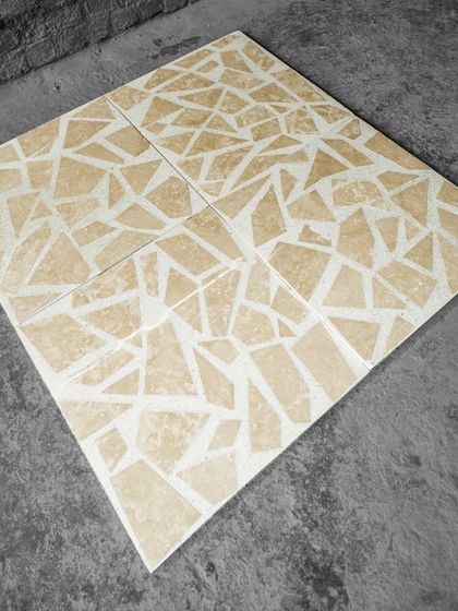 Four mosaic-style tiles laid together to show the full effect of the continuous, random pattern.