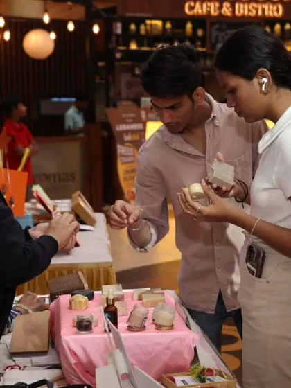Helping a young couple pick out products at my Growel's 101 stall.