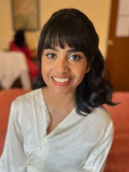 A close-up of Shruti's minimal and timeless wedding look. She wanted to look like herself, so we created a skin-like glowy base with soft champagne gold eyes.