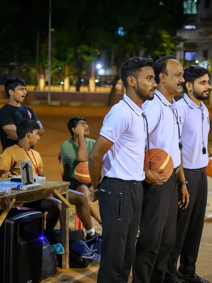 Our team of officials for Hooplah '24, ready for the game. Their professionalism is key to a smooth tournament.