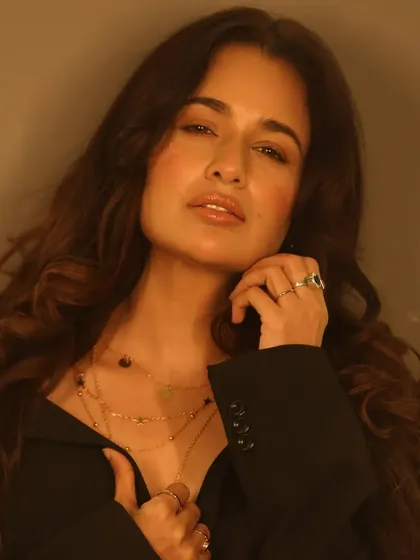A close-up of the soft glam look for Yuvika Chaudhary's brand shoot. I focused on creating a radiant complexion with gentle contouring and voluminous wavy hair, a perfect combination of grace and modern style.