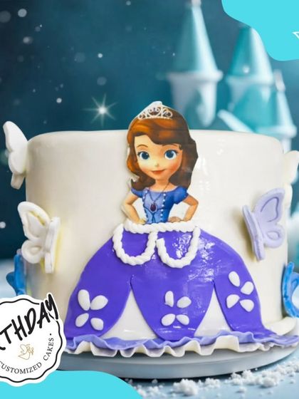 A cake fit for royalty, featuring Princess Sofia the First. The design includes her signature purple dress and delicate butterfly accents, creating a sweet and charming birthday centerpiece.