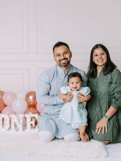 This is the complete first birthday experience I offer. We start with a fun cake smash, move to a playful bathtub session to get clean, and finish with some lovely candid family photos.