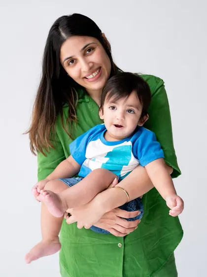 A playful moment with mom. I love capturing the energy and fun that mothers share with their children.