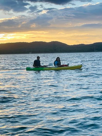 A peaceful sunset kayaking session, the perfect end to an adventurous day.