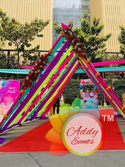 We love bringing high energy and vibrant color to festive celebrations. This bold and playful entrance was designed for a Holi party, using colorful ribbons and geometric structures to create a dynamic and welcoming pathway for guests.