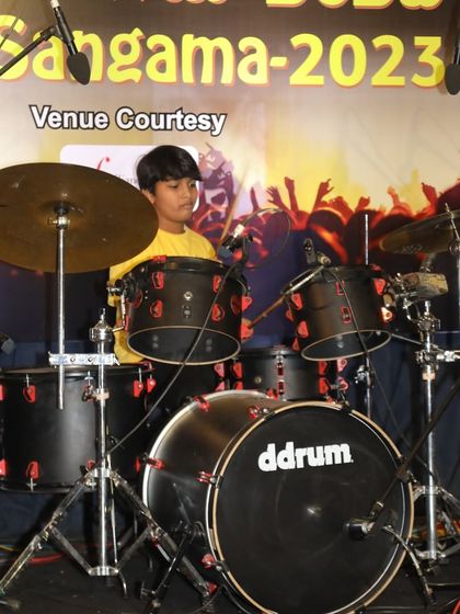 A close-up of Manish, one of our talented young drummers, during the 'Varaha Roopam' performance.
