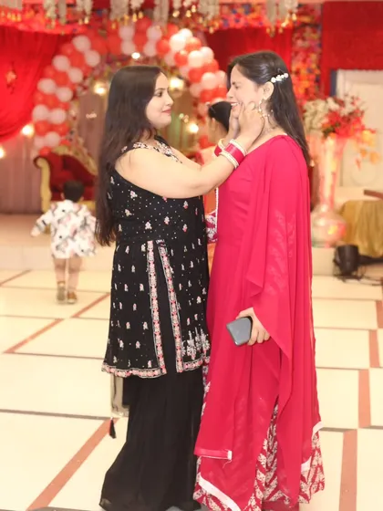 An affectionate moment between two family members, filled with emotion. These are the 'yaadein' that you will look back on and smile.