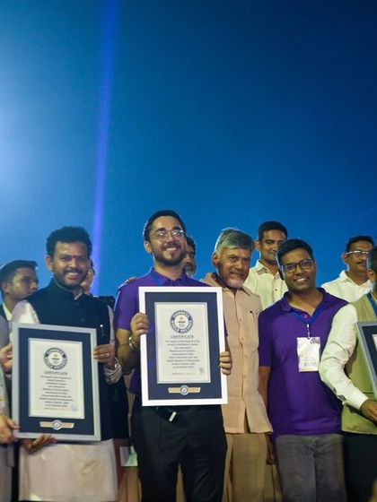 Our team proudly holds the five Guinness World Record certificates on stage. This moment represents the culmination of immense hard work, innovation, and teamwork.