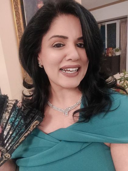 A close-up from the Bridgerton-themed New Year's Eve party. The off-shoulder neckline of the gown was perfect for showcasing my mother's beautiful diamond necklace.