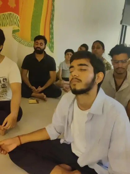 Young seekers absorbed in the practice. It is heartening to see the next generation embracing the spiritual path with such sincerity.